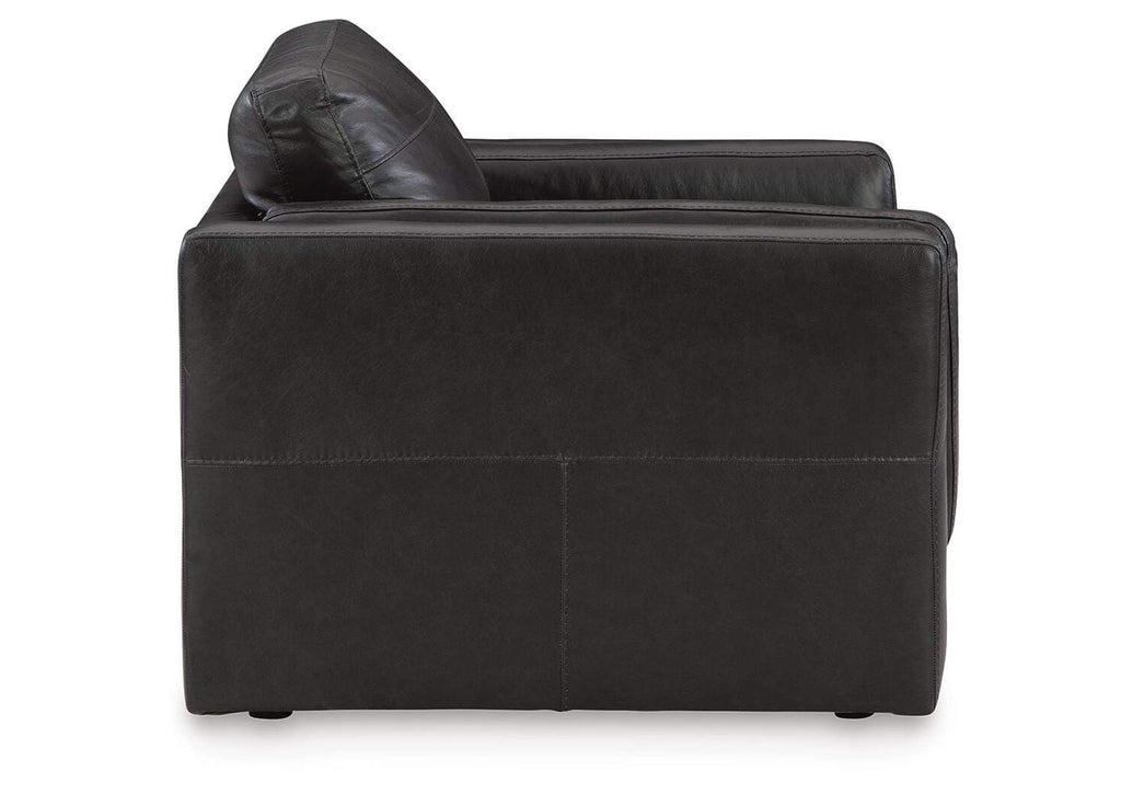 Amiata Chair and Ottoman side view