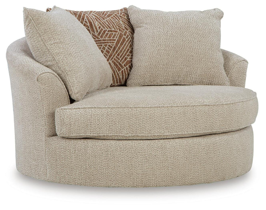 Steelwater Retreat Oversized Swivel Accent Chair in Latte, angle view