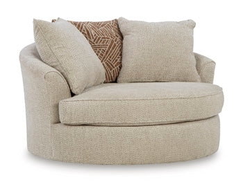 Steelwater Retreat Oversized Swivel Accent Chair in Latte, angle view