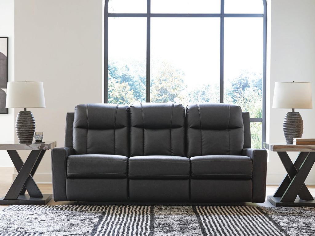 Mackmenville Reclining Sofa in Carbon, closed view