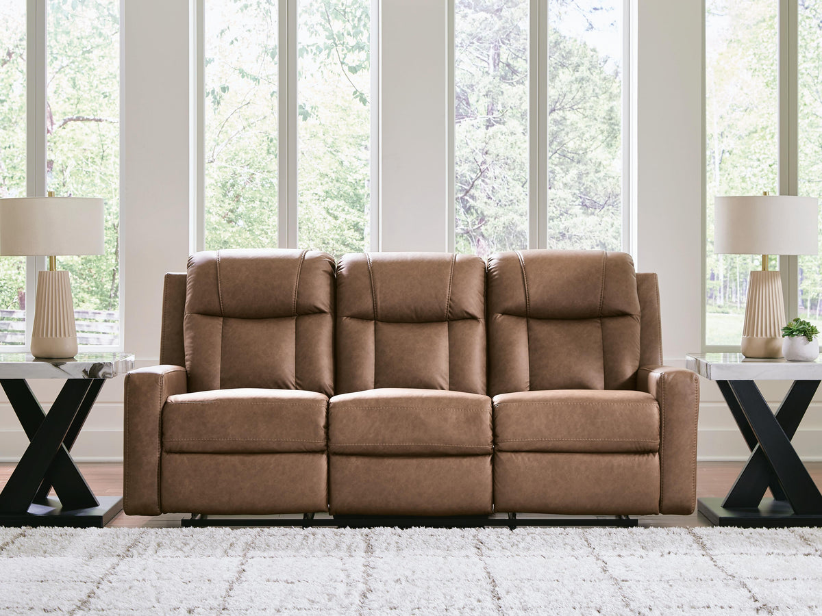 Mackmenville Reclining Sofa in Caramel, closed view