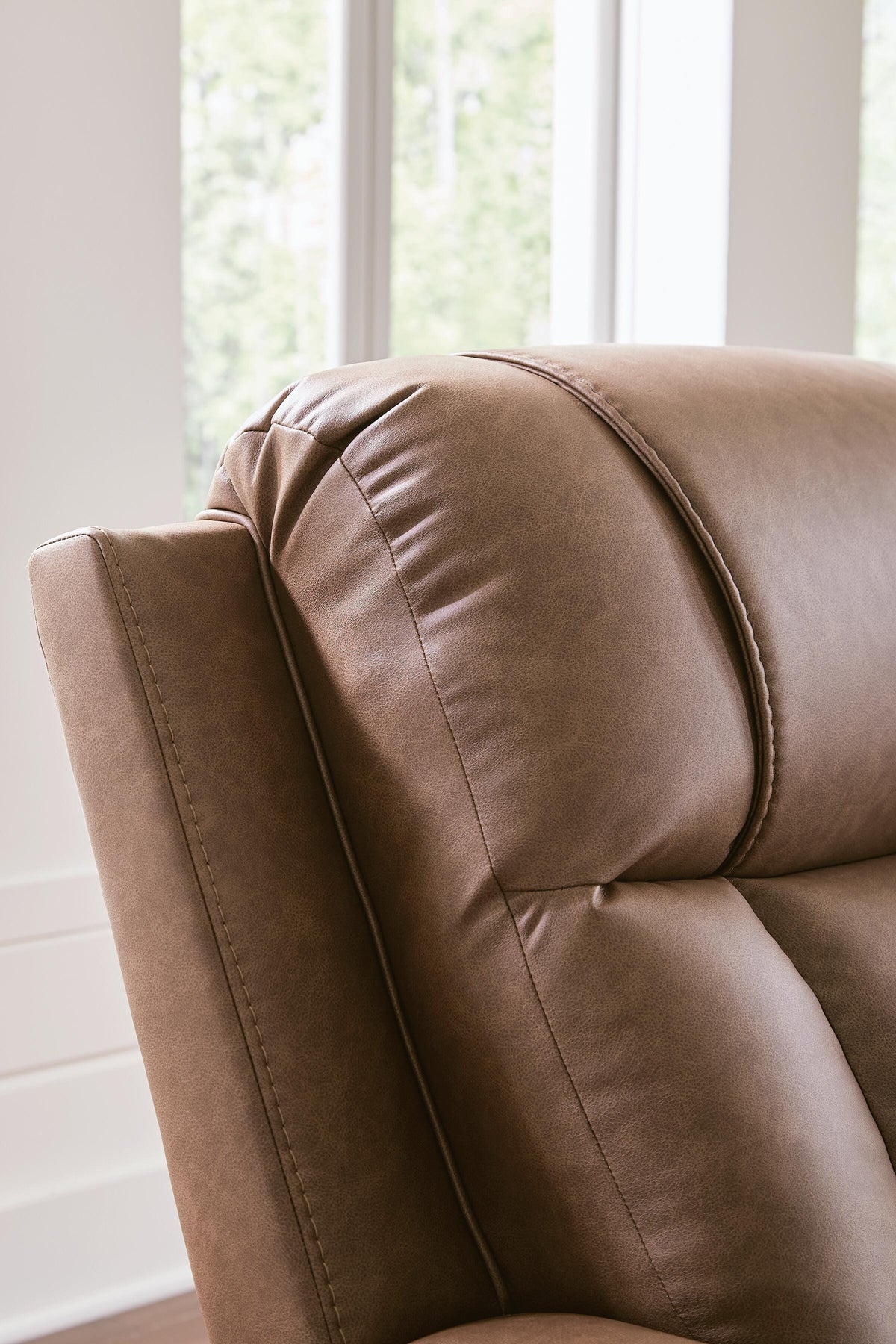 Mackmenville Reclining Sofa in Caramel, detail view