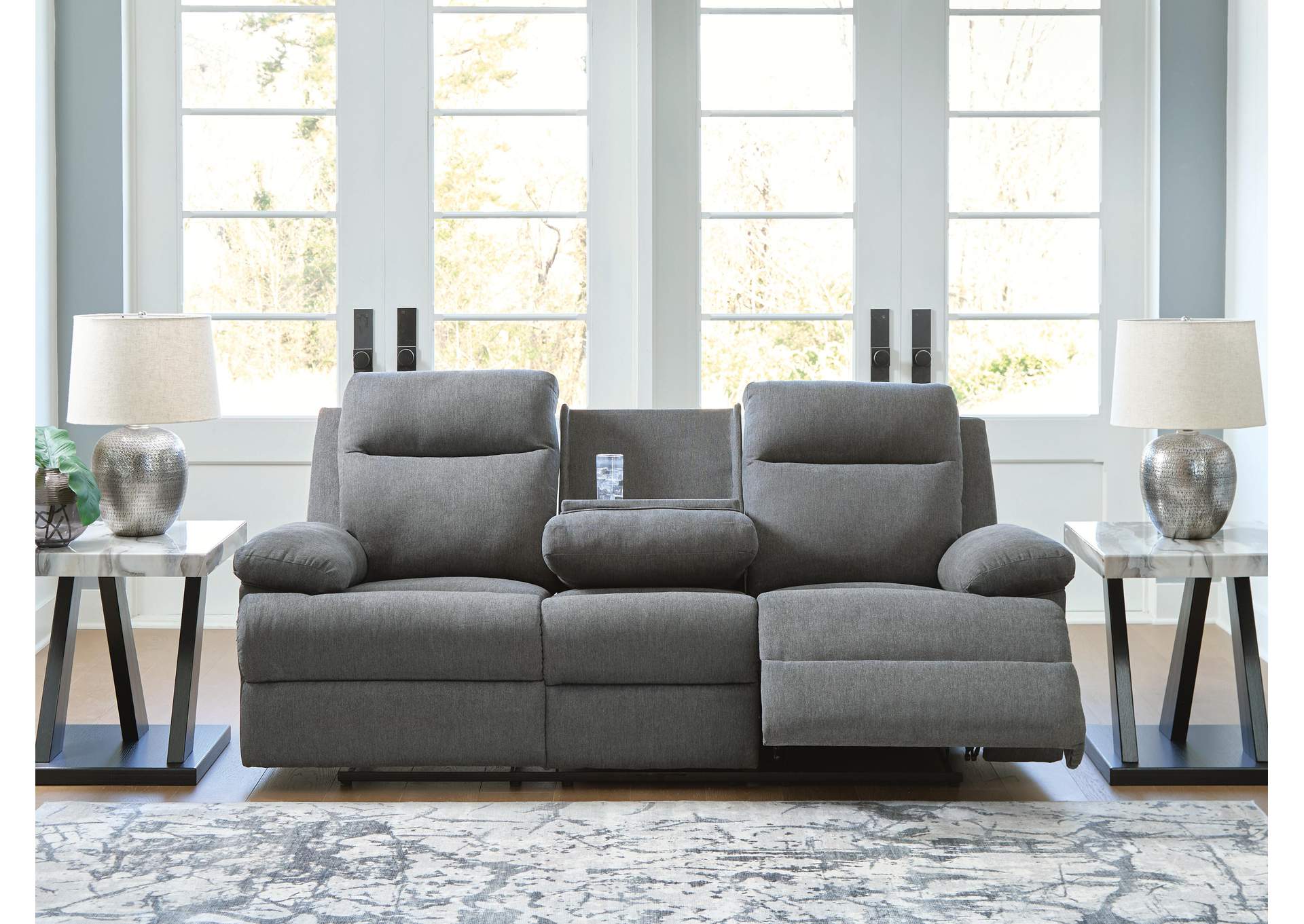 Side-Swipe Reclining Sofa with Drop Down Table side view
