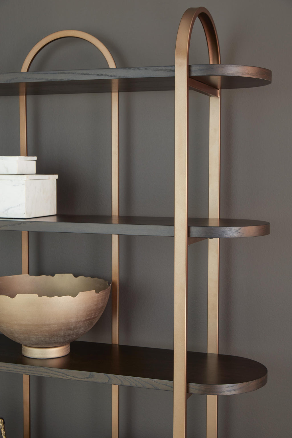 Brentmour Bookcase in Brown/Gold Finish, detail view