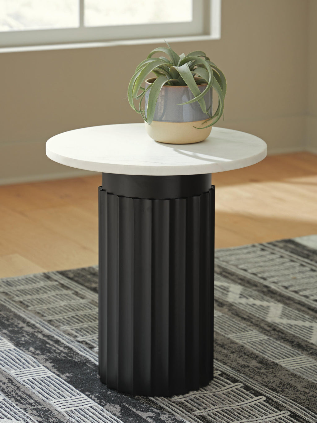 Wainstone Accent Table in Black/White, lifestyle view