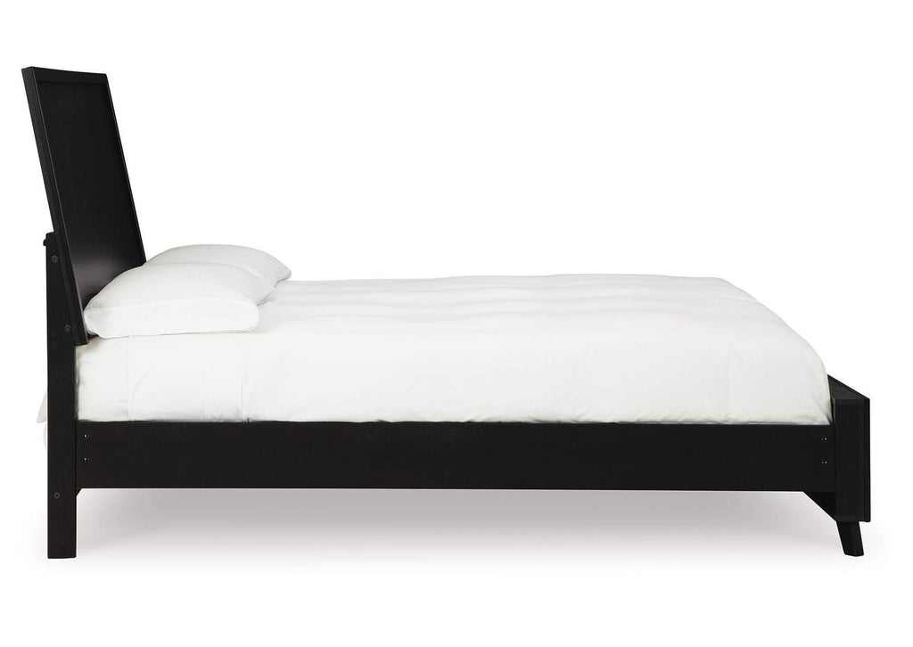 Danziar King Panel Bed with Mirrored Dresser and Nightstand side view