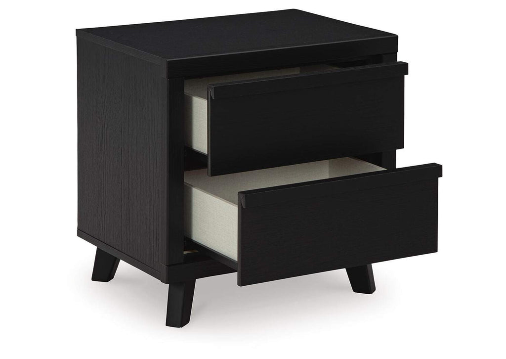 Danziar King Panel Bed with Mirrored Dresser and Nightstand angled view