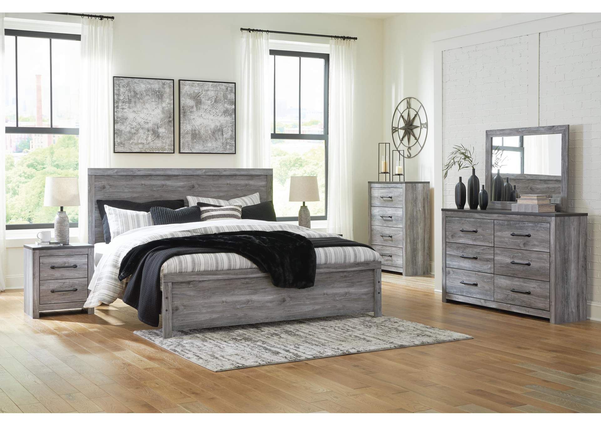 Bronyan King Panel Bed with Mirrored Dresser and Nightstand
