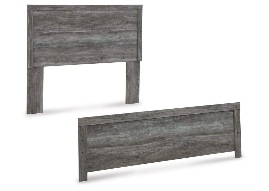 Bronyan Queen Panel Bed with Mirrored Dresser and Nightstand angled view