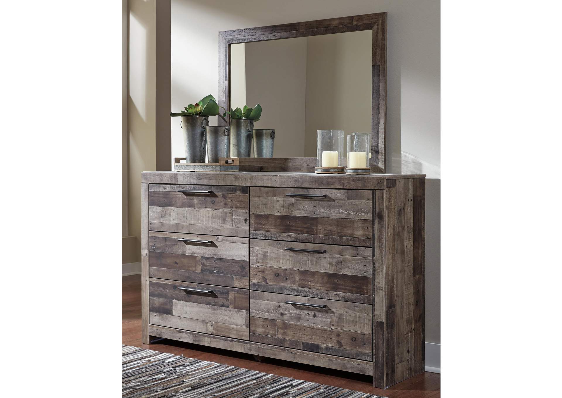 Derekson King Panel Bed with Mirrored Dresser, Chest and Nightstand room view