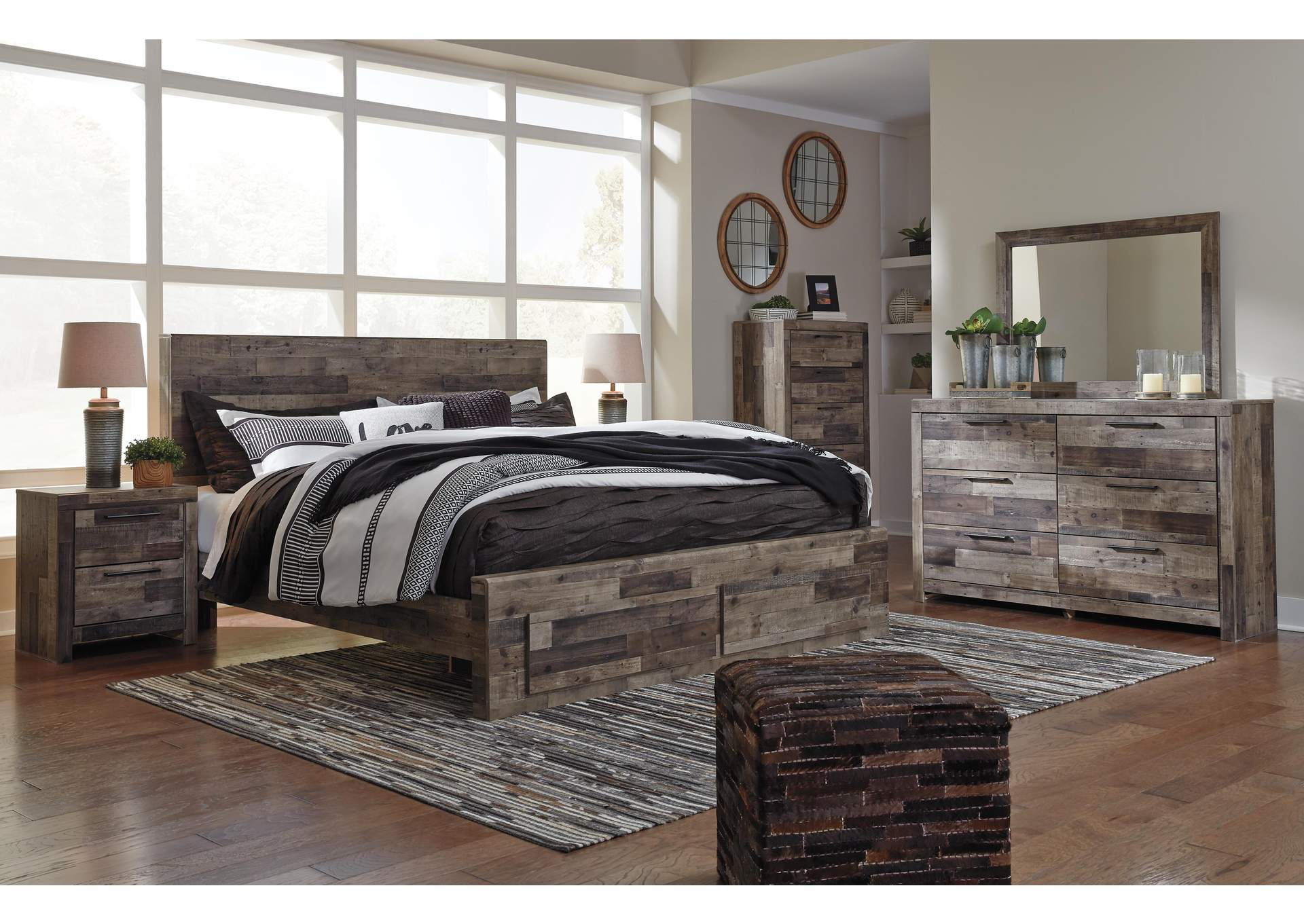 Derekson King Panel Bed with 2 Storage Drawers with Mirrored Dresser, Chest and Nightstand