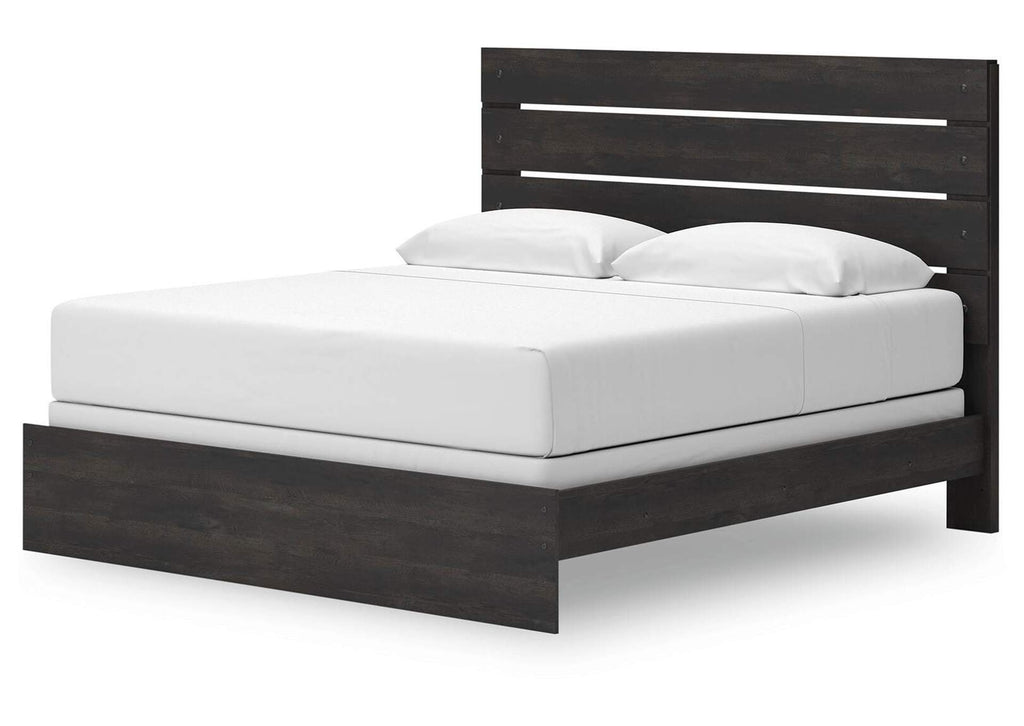 Delmorta King Panel Bed, Dresser, Mirror and Nightstand angled view