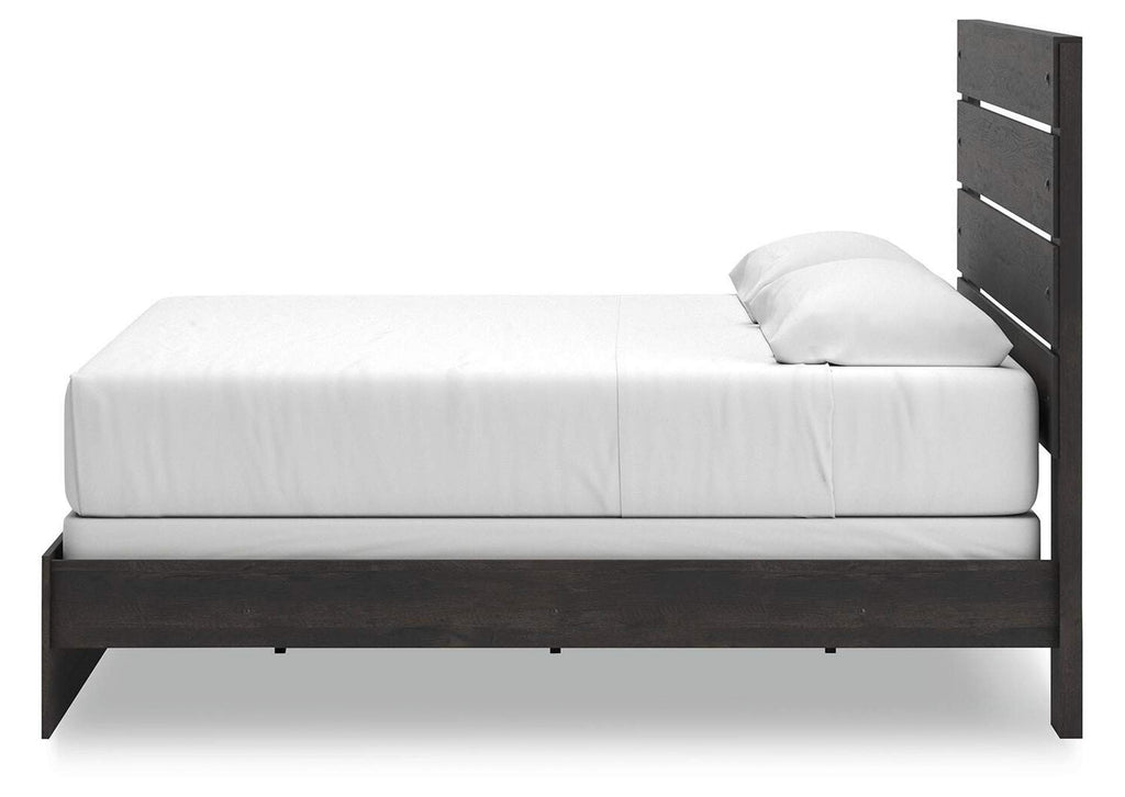 Delmorta King Panel Bed, Dresser, Mirror and Chest side view