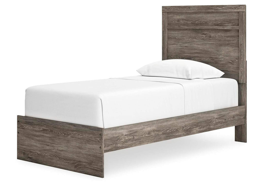 Ralinksi Twin Panel Bed with Mirrored Dresser and Chest angled view