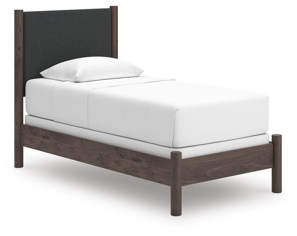 Pamytta Twin Upholstered Panel Bed in Brown, angle view