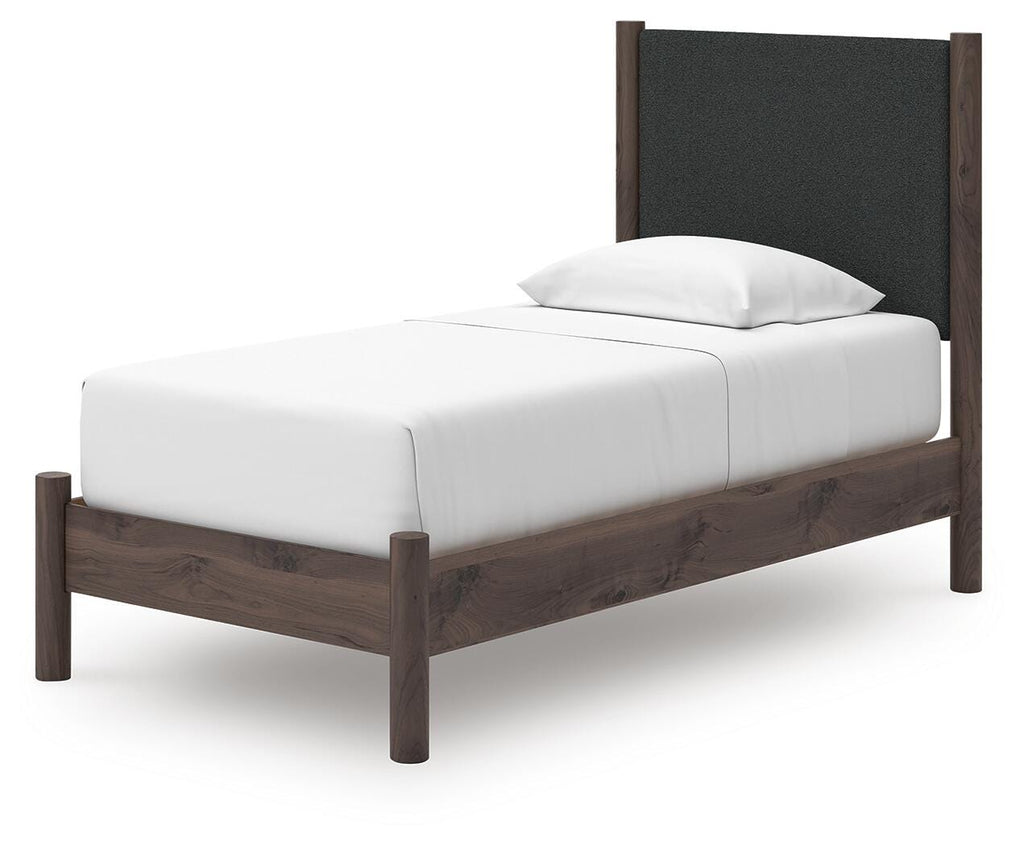 Pamytta Twin Upholstered Panel Platform Bed in Brown, angle view