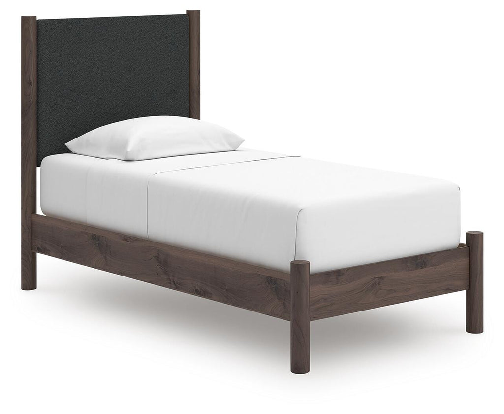 Pamytta Twin Upholstered Panel Platform Bed in Brown, angle view