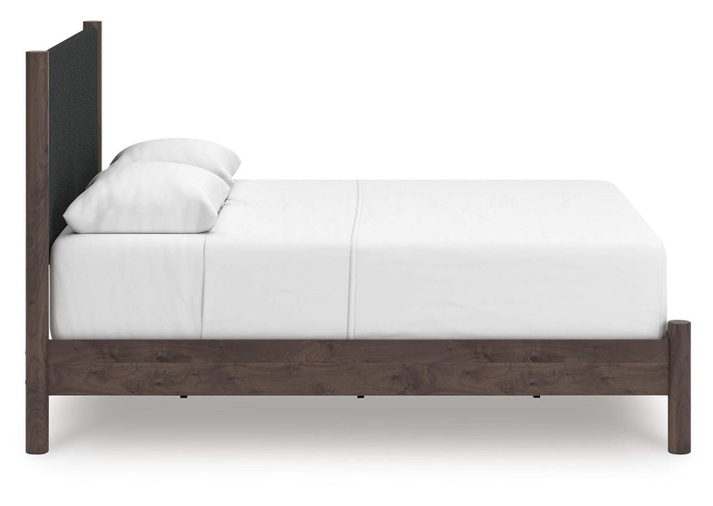 Cadmori Queen Upholstered Panel Bed and Dresser side view