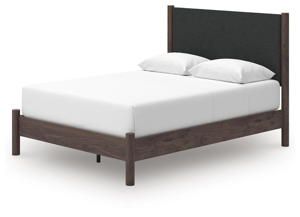 Pamytta Queen Upholstered Panel Platform Bed in Brown, angle view