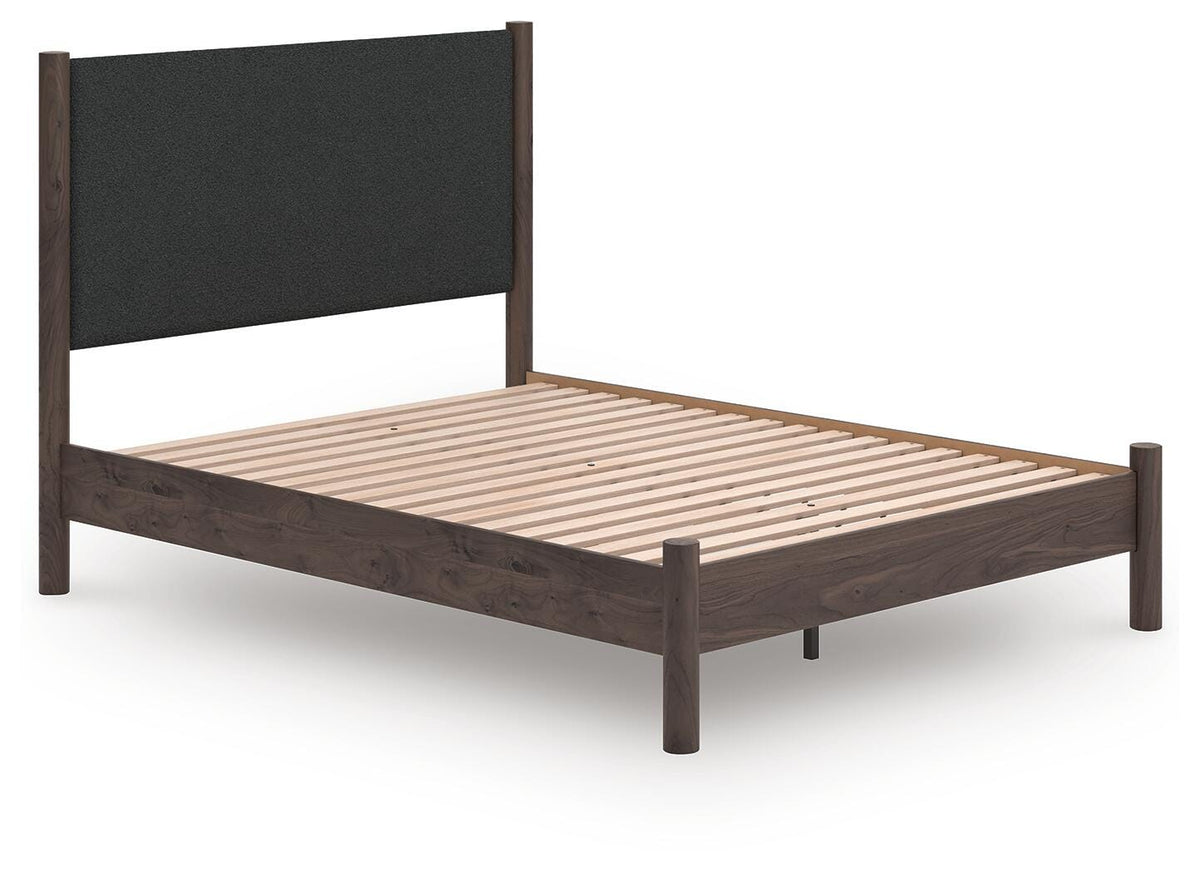 Pamytta Queen Upholstered Panel Platform Bed in Brown, angle view
