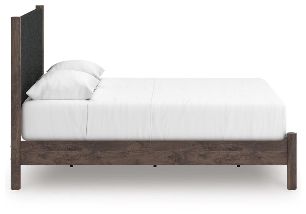 Pamytta Queen Upholstered Panel Platform Bed in Brown, side view