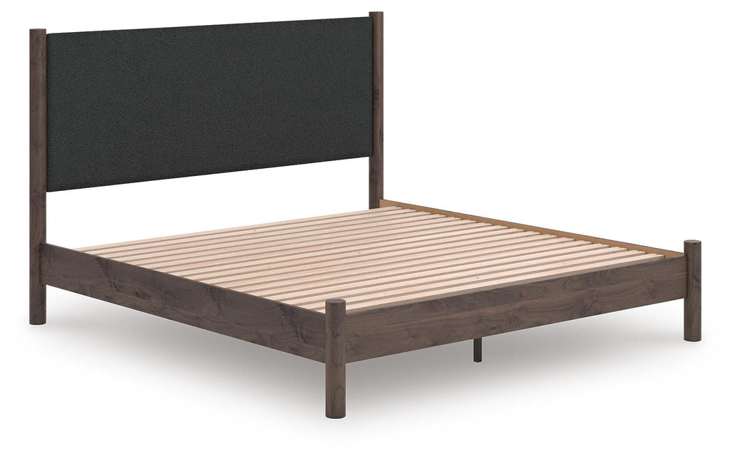 Pamytta King Upholstered Panel Platform Bed in Brown, angle view