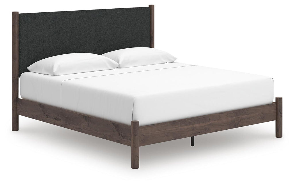 Pamytta King Upholstered Panel Platform Bed in Brown, angle view