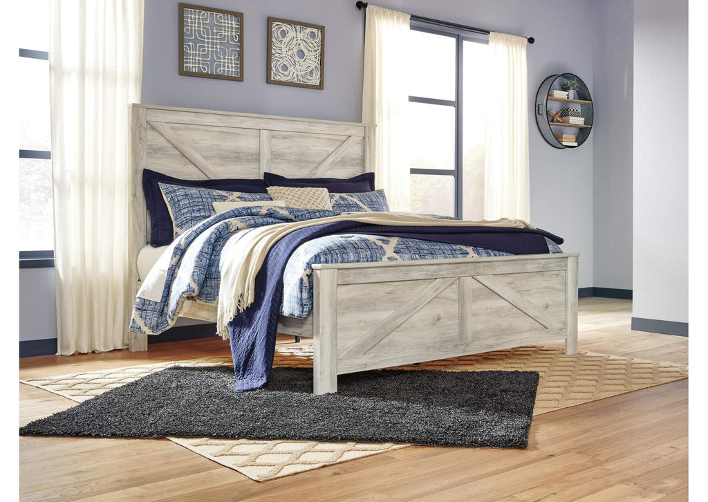 Bellaby King Crossbuck Panel Bed with Mirrored Dresser and Chest
