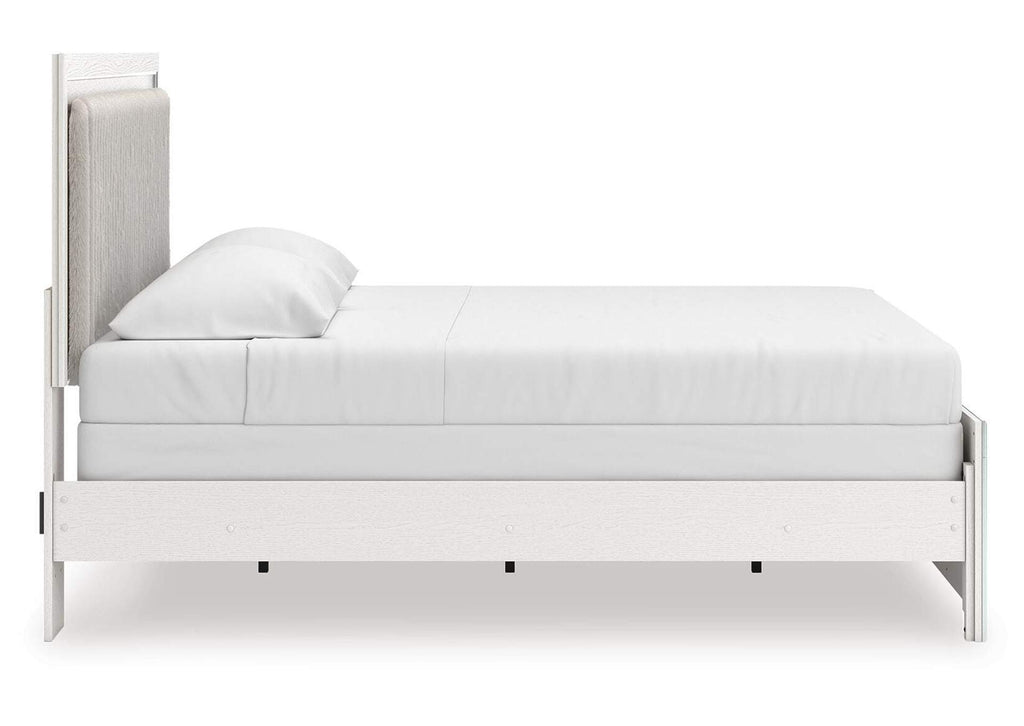Birmonton King Upholstered Panel Bed, Dresser, Mirror, Chest and Nightstand side view
