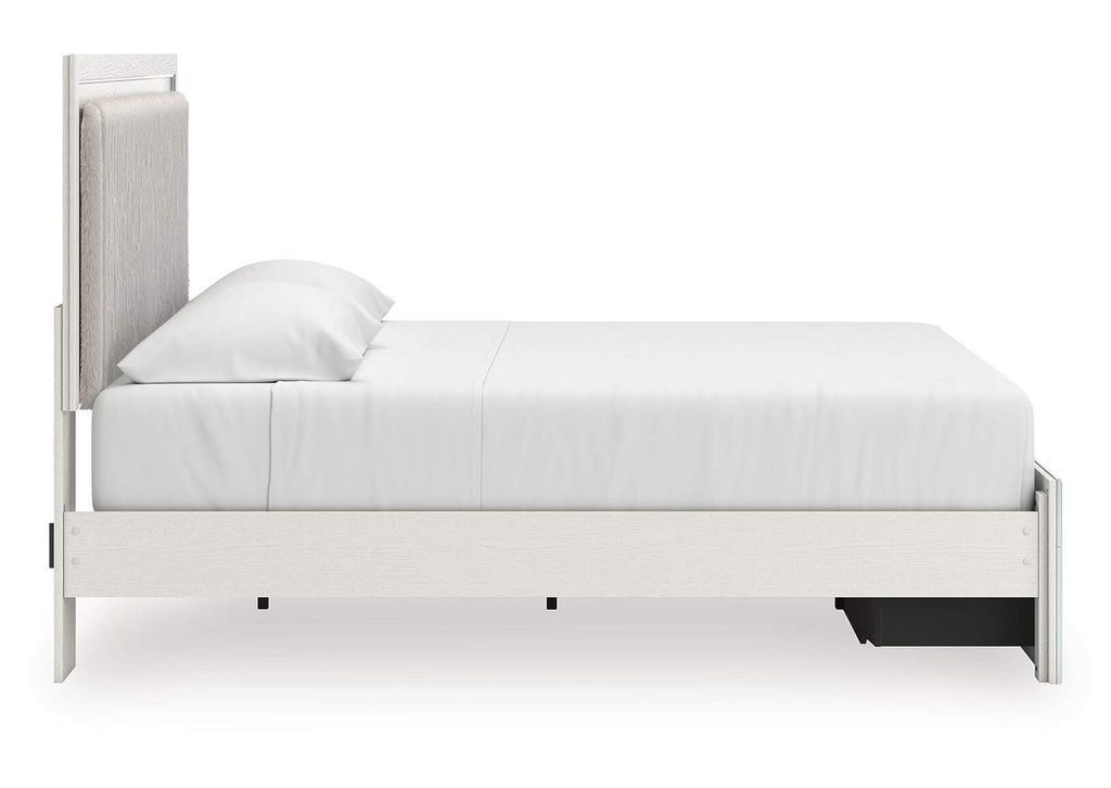 Birmonton King Upholstered Panel Platform Storage Bed and Dresser side view