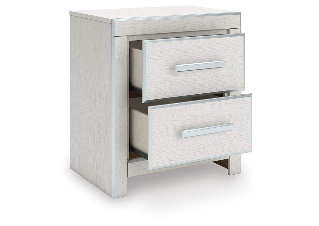 Birmonton King Upholstered Panel Platform Storage Bed, Chest and Nightstand angled view