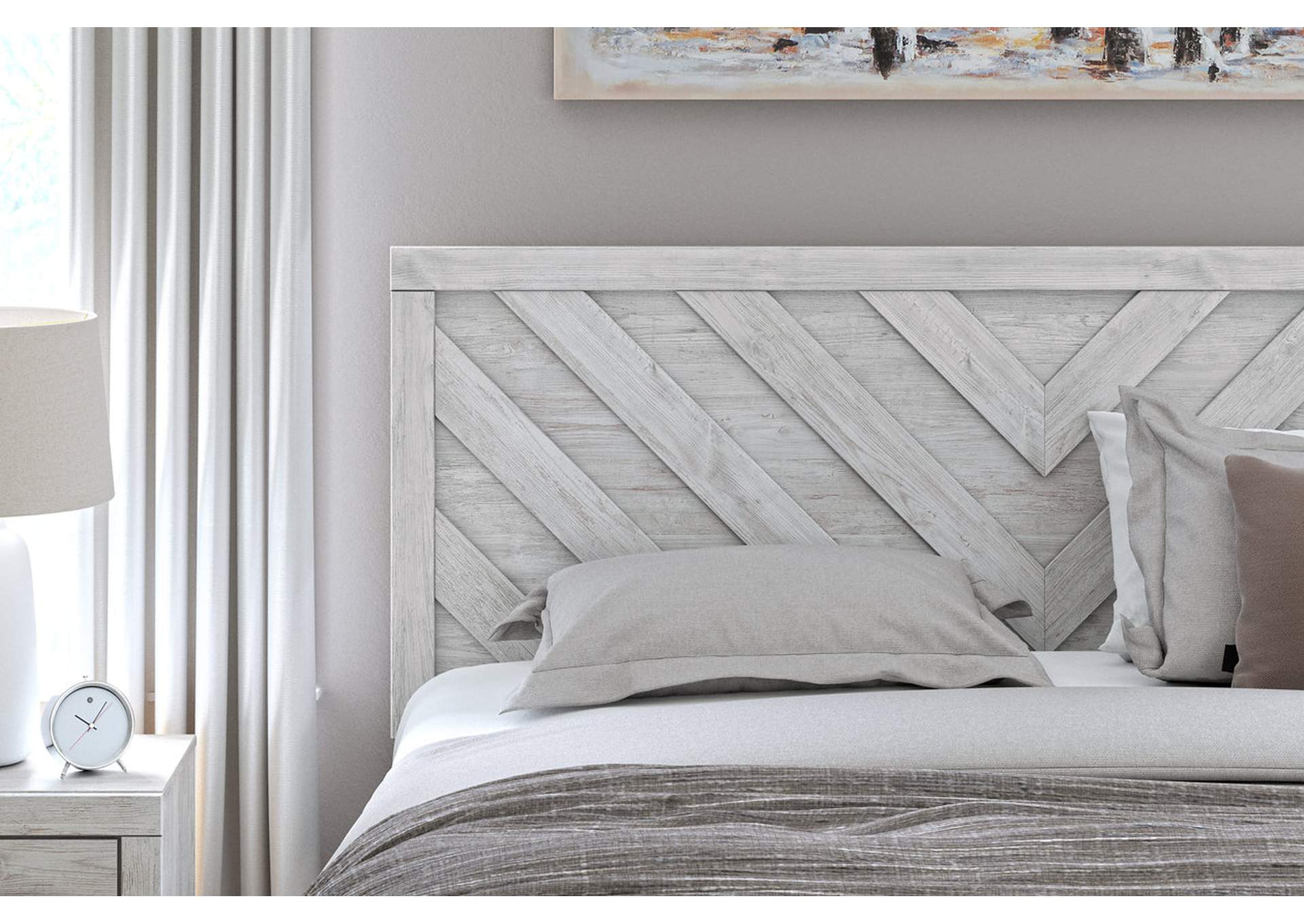 Cayboni King Panel Bed with Mirrored Dresser detail