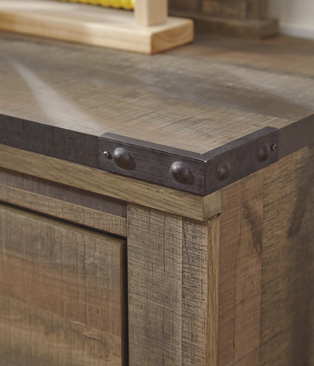 Trinell Chest of Drawers in Brown, detail view