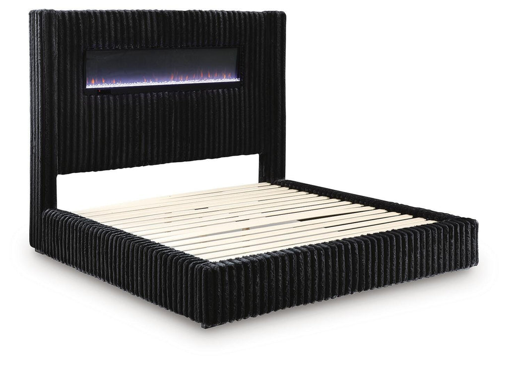 Tayleena King Upholstered Bed with Fireplace and Wireless Audio in Black, angle view