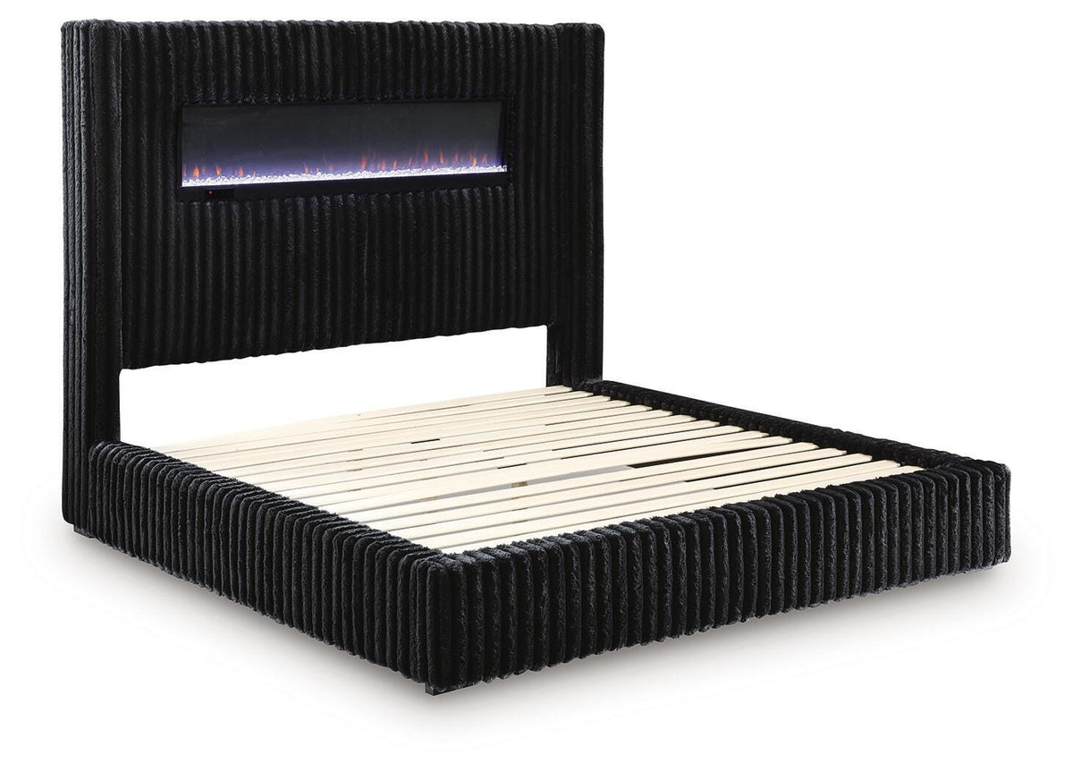 Tayleena King Upholstered Bed with Fireplace and Wireless Audio in Black, angle view