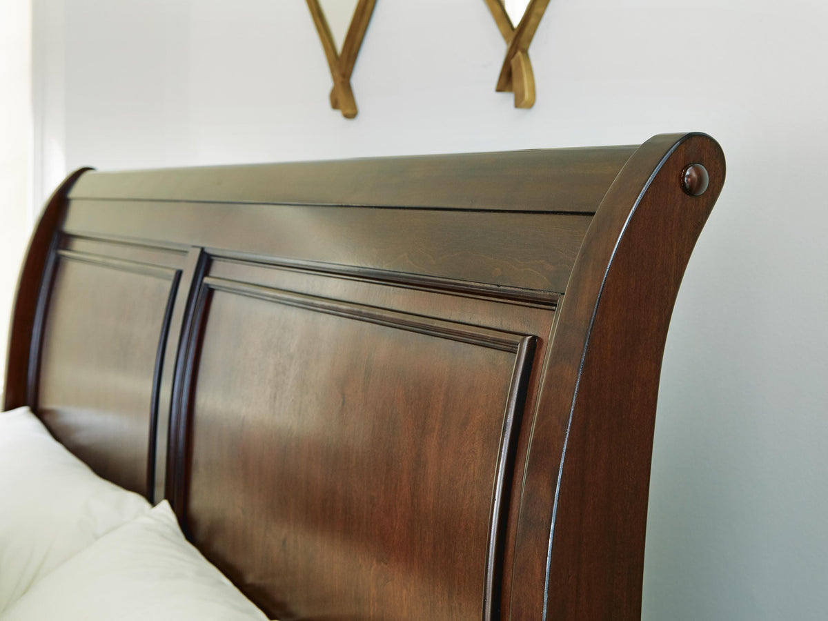 Trellington Queen Sleigh Storage Bed in Brown, detail view