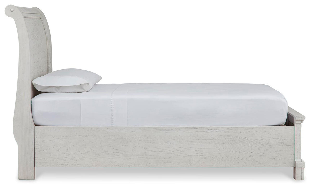 Robbinsdale Twin Sleigh Storage Bed in Antique White, side view