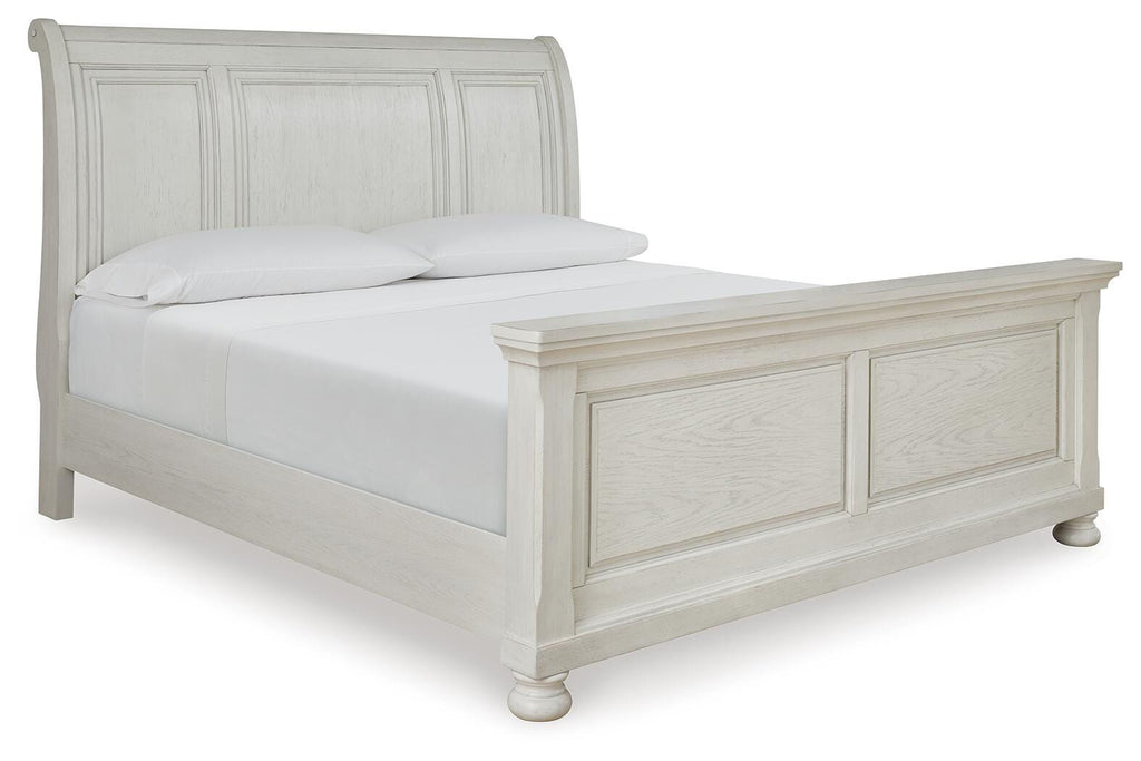 Robbinsdale King Sleigh Bed in Antique White, angle view