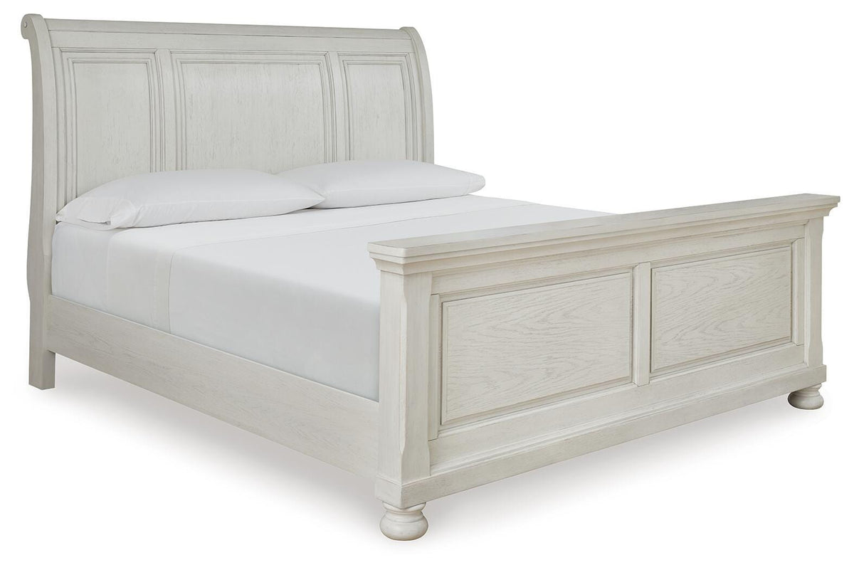 Robbinsdale King Sleigh Bed in Antique White, angle view