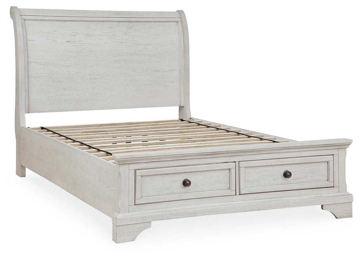 Robbinsdale Full Sleigh Storage Bed in Antique White, angle view