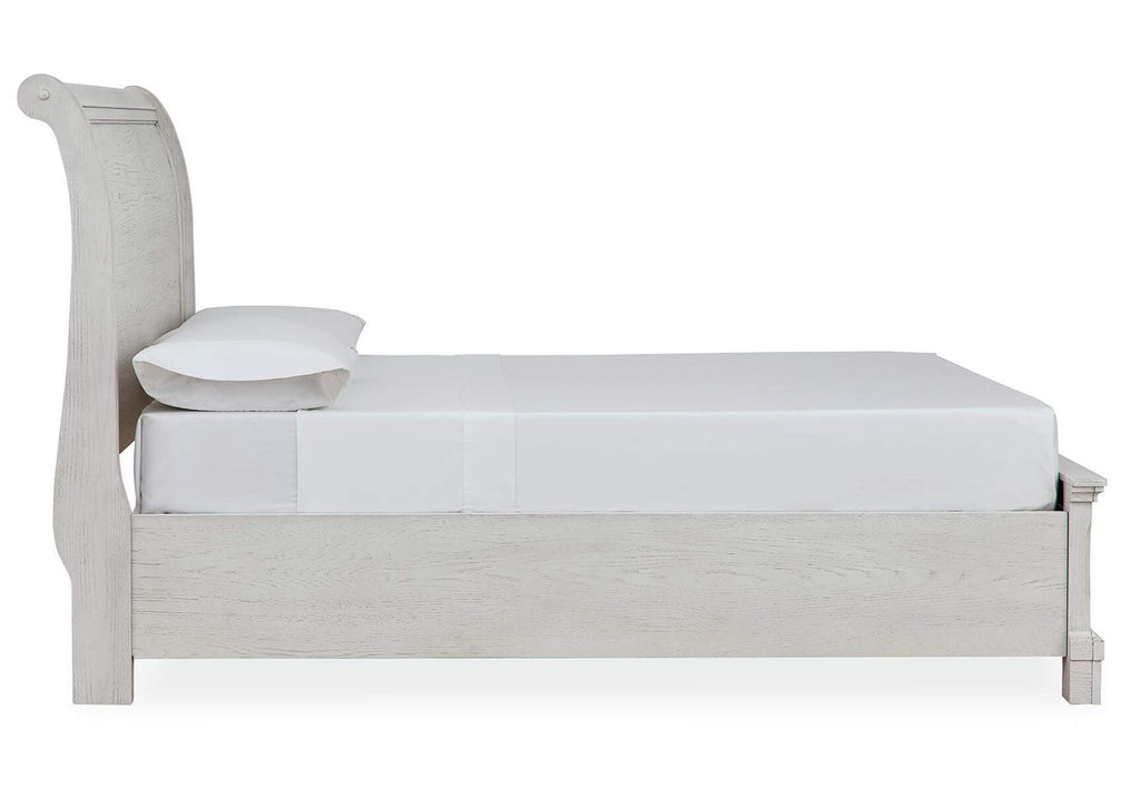 Robbinsdale Full Storage Bed and Nightstand side view