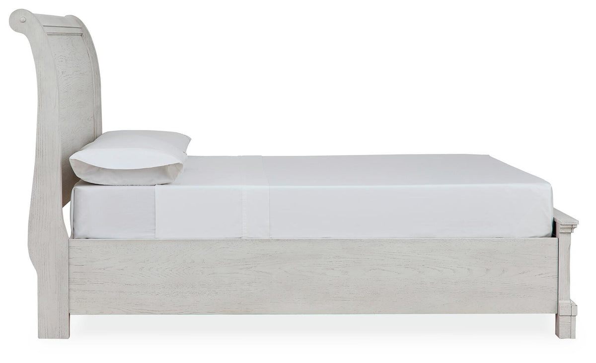 Robbinsdale Full Sleigh Storage Bed in Antique White, side view