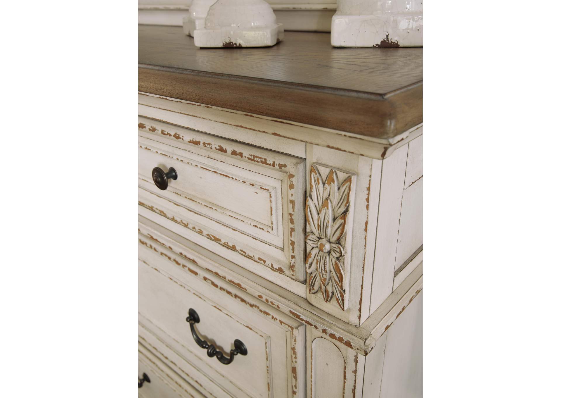 Realyn Queen Upholstered Panel Bed with Dresser detail