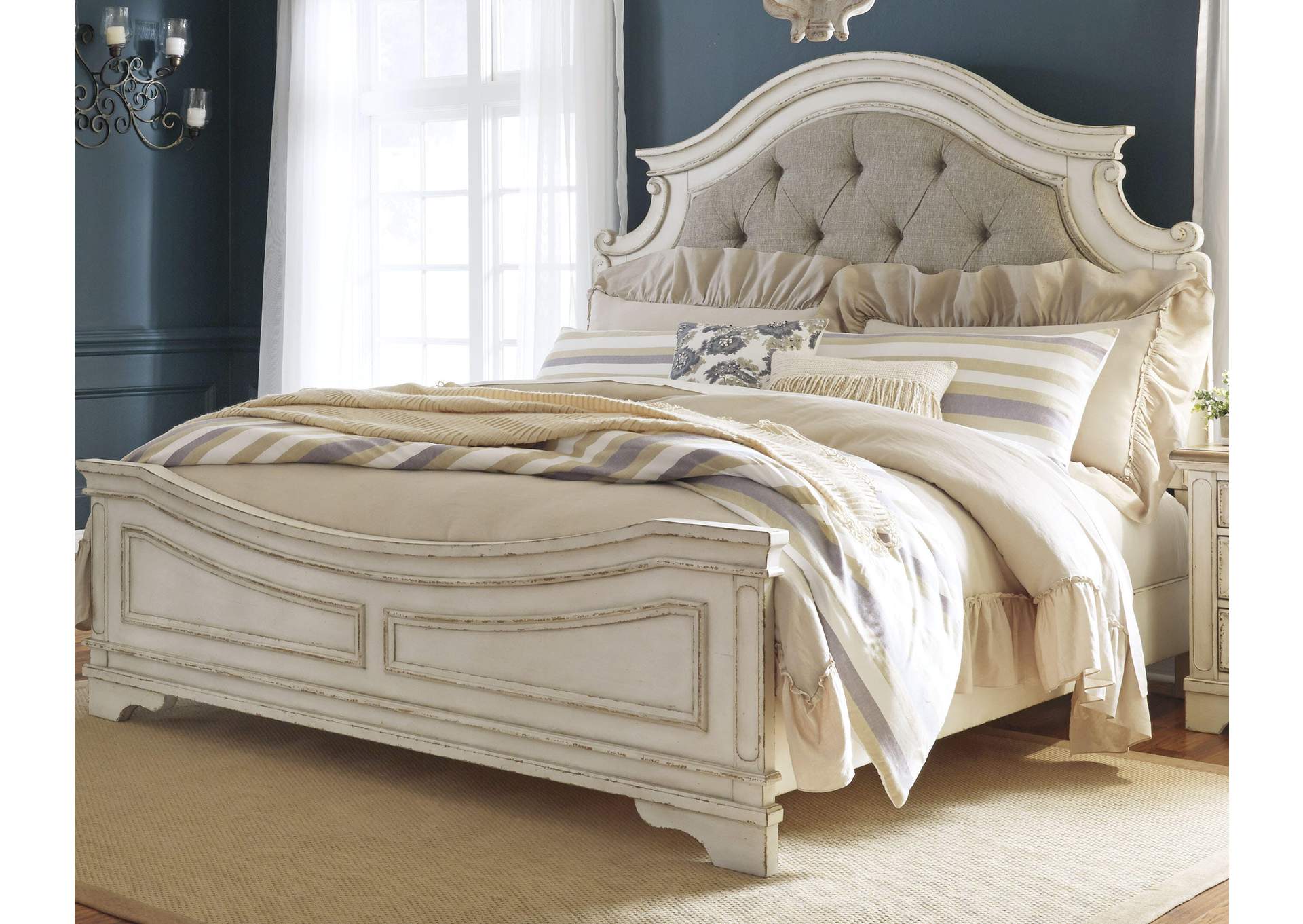 Realyn California King Upholstered Panel Bed with Mirrored Dresser room view