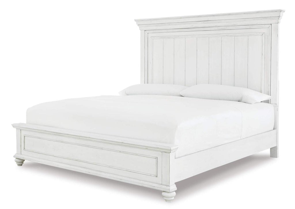 Kanwyn Queen Panel Bed with Mirrored Dresser and 2 Nightstands angled view