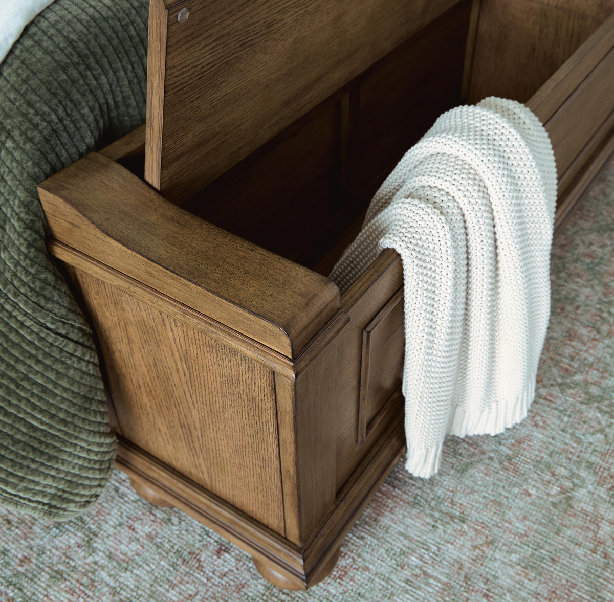 Karallin California King Panel Storage Bed in Medium Brown, detail view