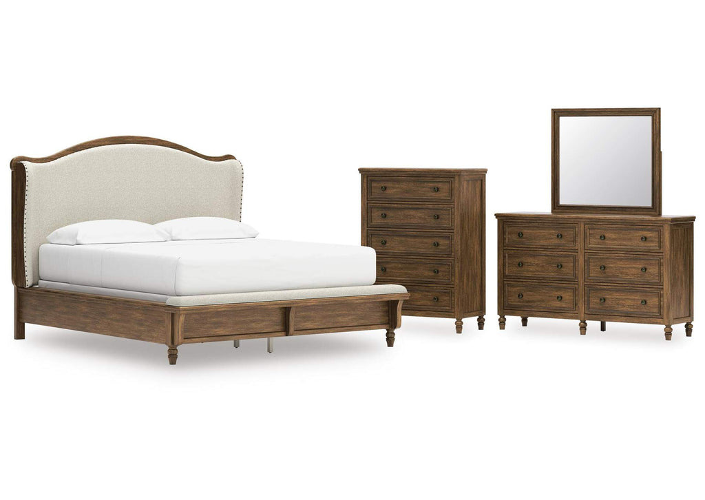 Sturlayne California King Upholstered Panel Bed, Dresser, Mirror and Chest