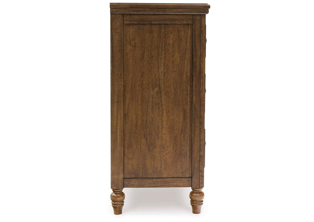 Sturlayne California King Upholstered Panel Bed and Dresser side view