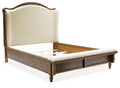 Sturlayne Queen Upholstered Panel Bed in Brown, angle view