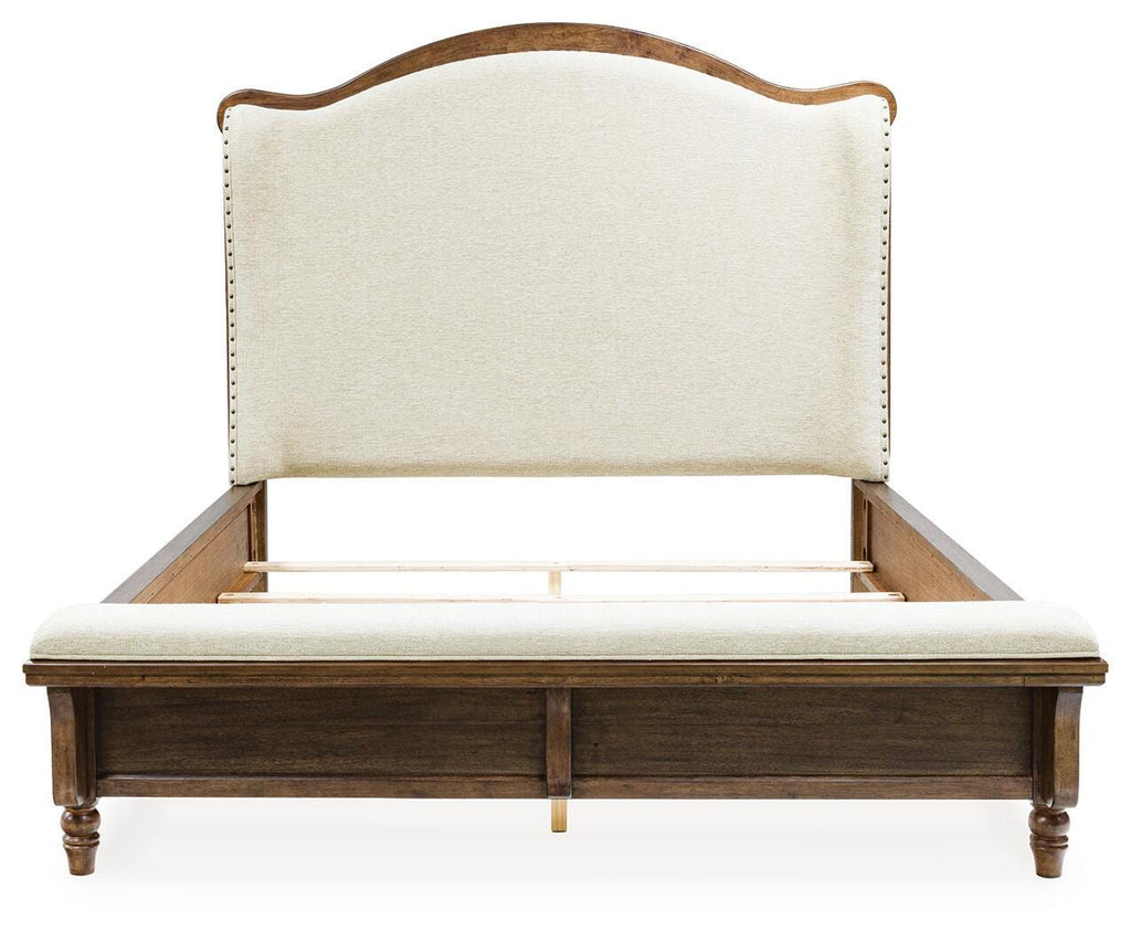 Sturlayne Queen Upholstered Panel Bed in Brown, front view